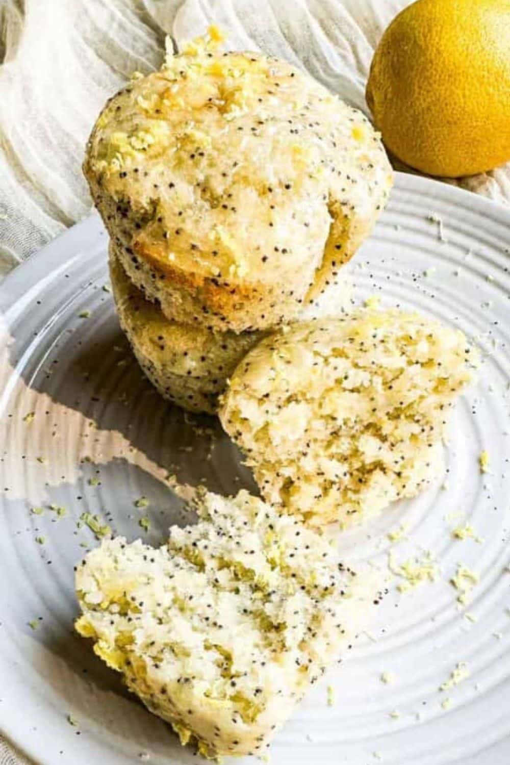Freshly prepared croissant dough with poppy seeds and lemon zest for perfect baking.