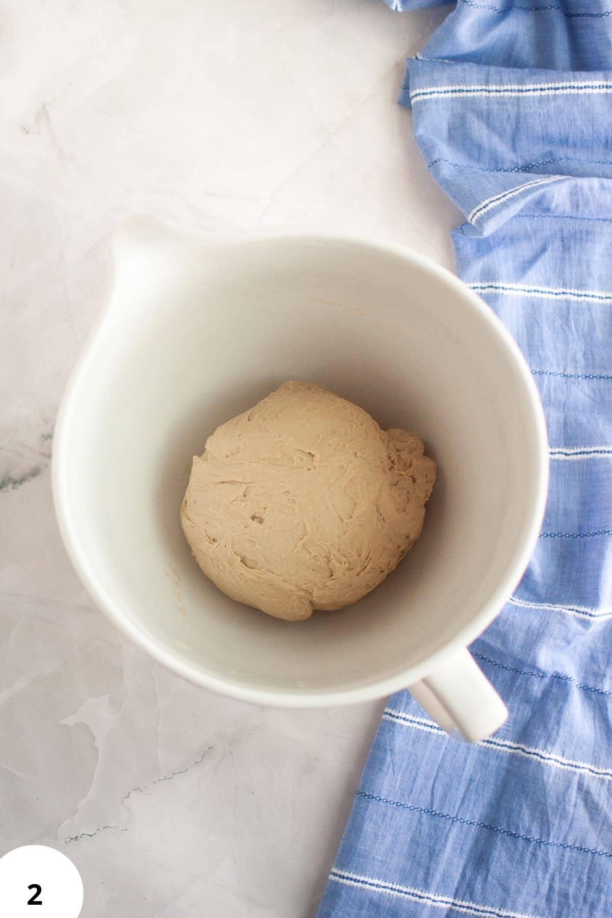 Fresh dough for bread baking with stretch and fold method, ready for proofing.