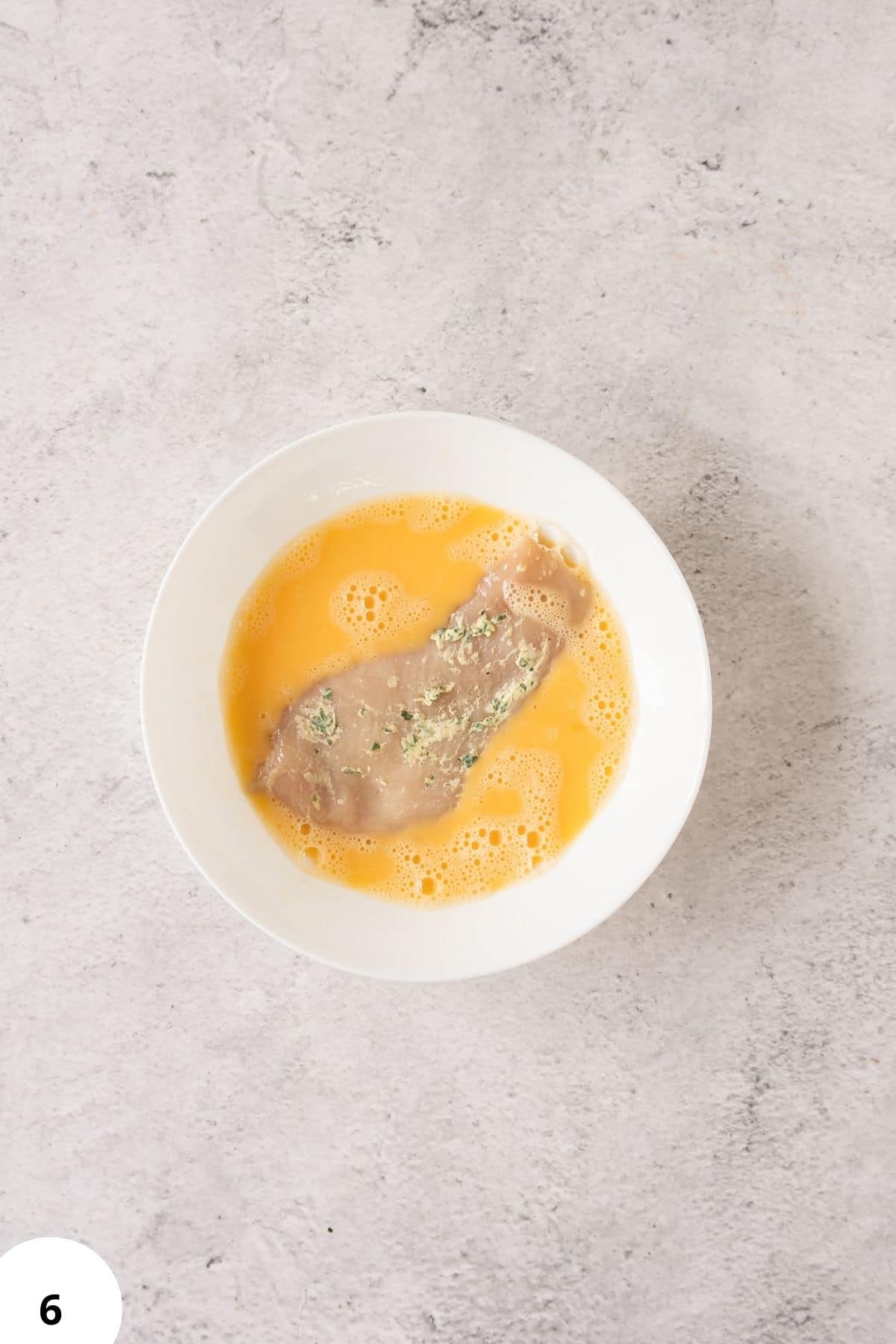 Delicious bread dough being stretched and folded for perfect texture.