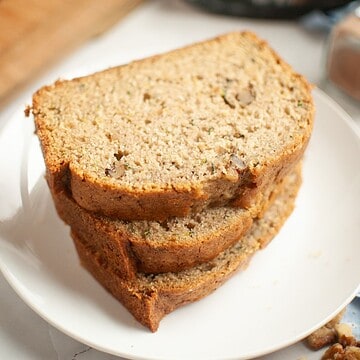 Delicious sourdough discard zucchini bread featuring walnuts, perfect for easy baking and healthy sn.