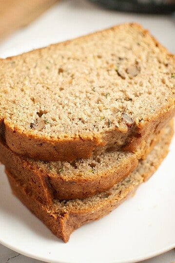 Delicious sourdough discard zucchini bread featuring walnuts, perfect for easy baking and healthy sn.