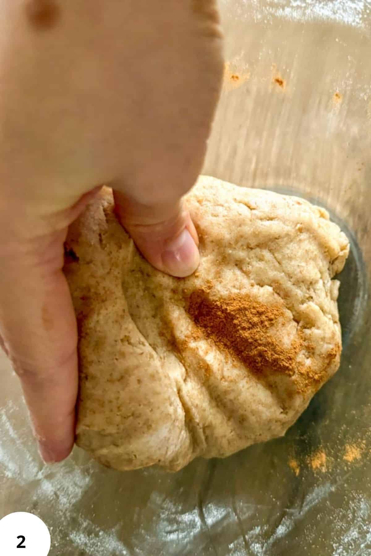 Close-up of dough with cinnamon for homemade cereal.