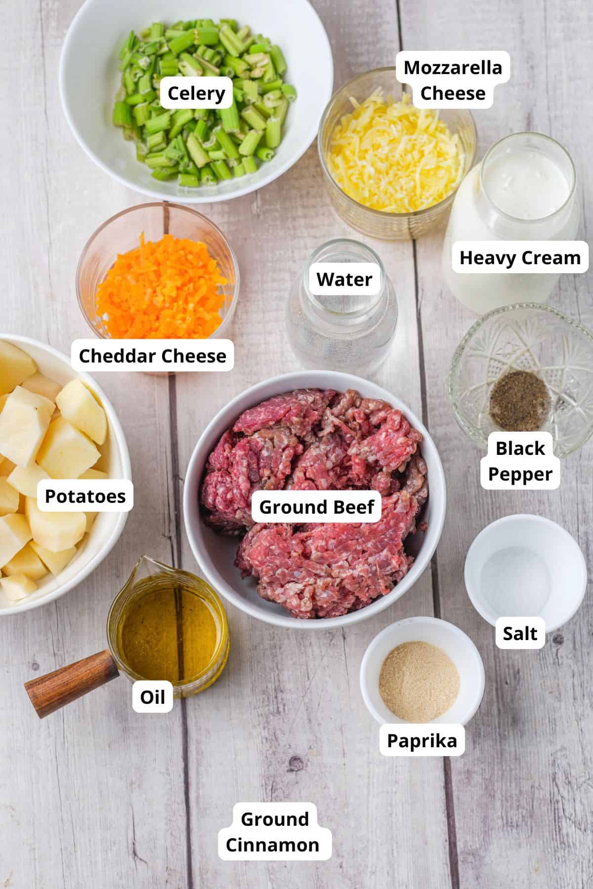 Ingredients for hamburger and potato soup with ground beef and vegetables.
