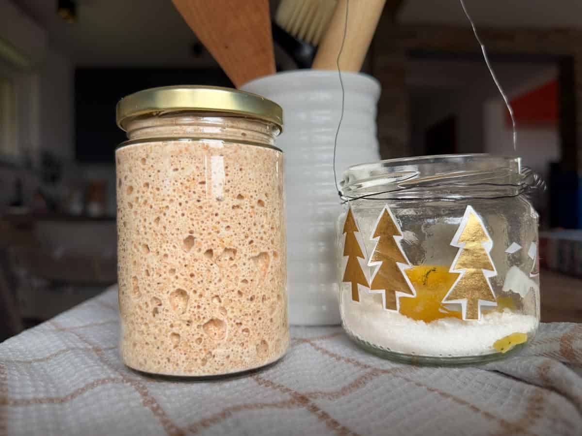Fresh milled flour sourdough starter in a jar for homemade bread.