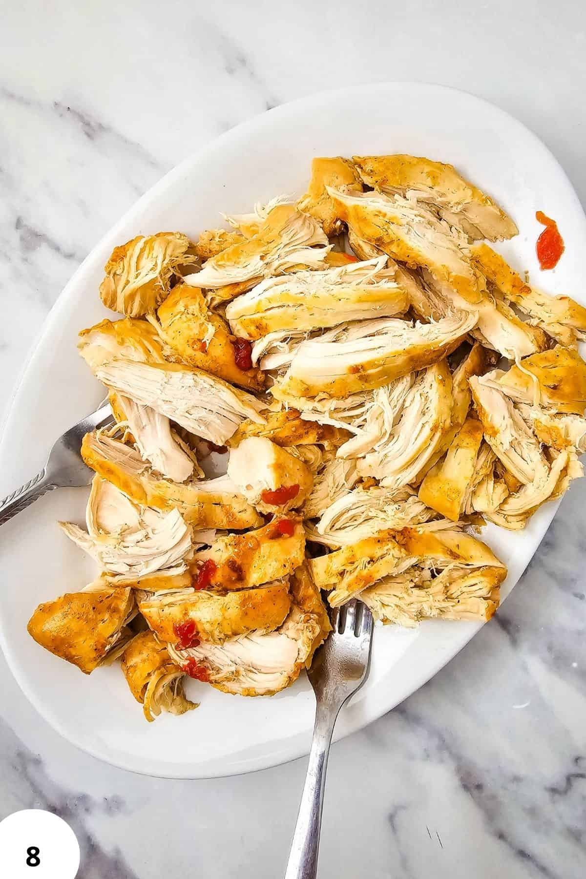 Chicken fajitas cooked in a slow cooker with peppers and spices. Perfect for easy, flavorful meals.