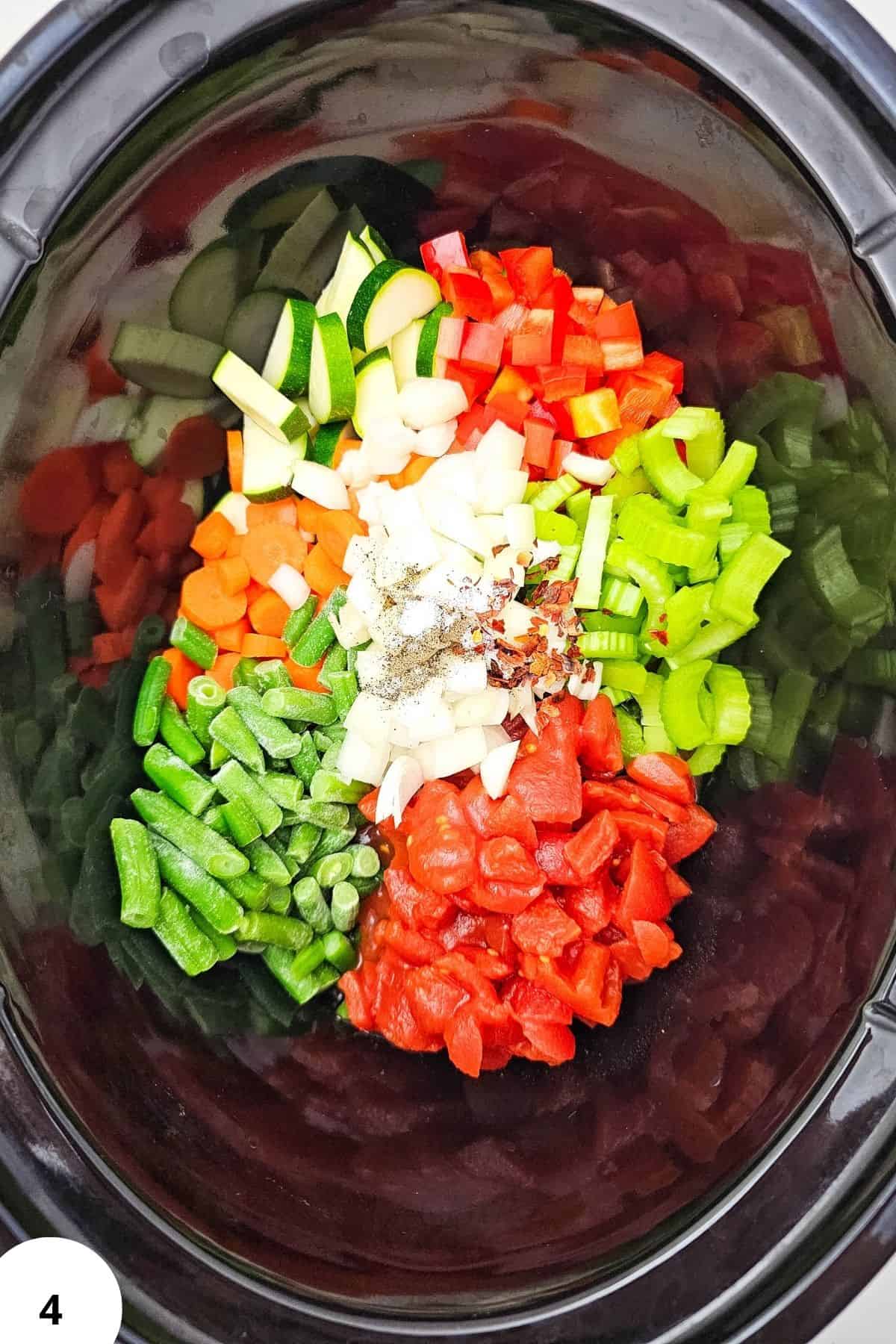 Fresh chopped vegetables for slow cooker summer vegetable soup.