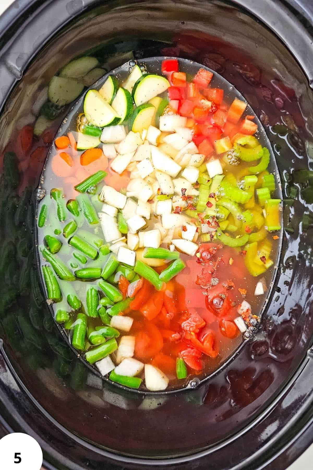 Fresh chopped vegetables for slow cooker summer vegetable soup.
