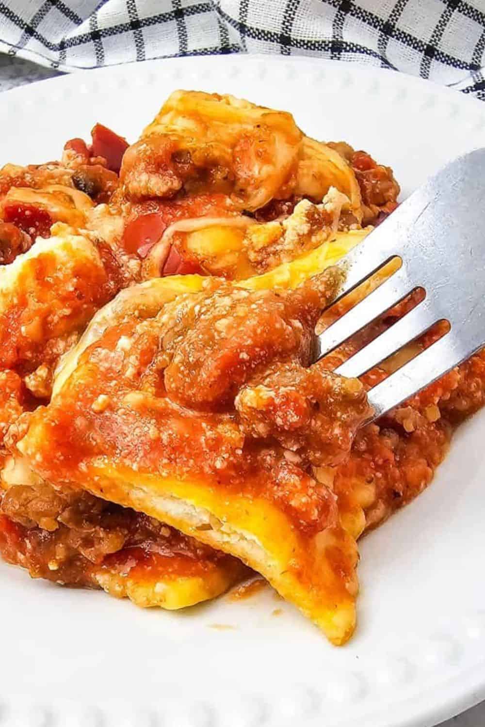 Delicious baked pasta with rich tomato sauce and melted cheese.