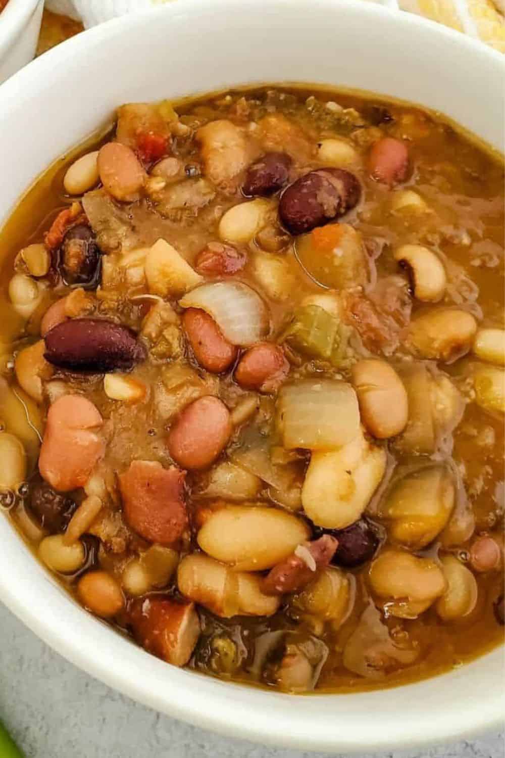 Bread dough being stretched and folded during fermentation process.