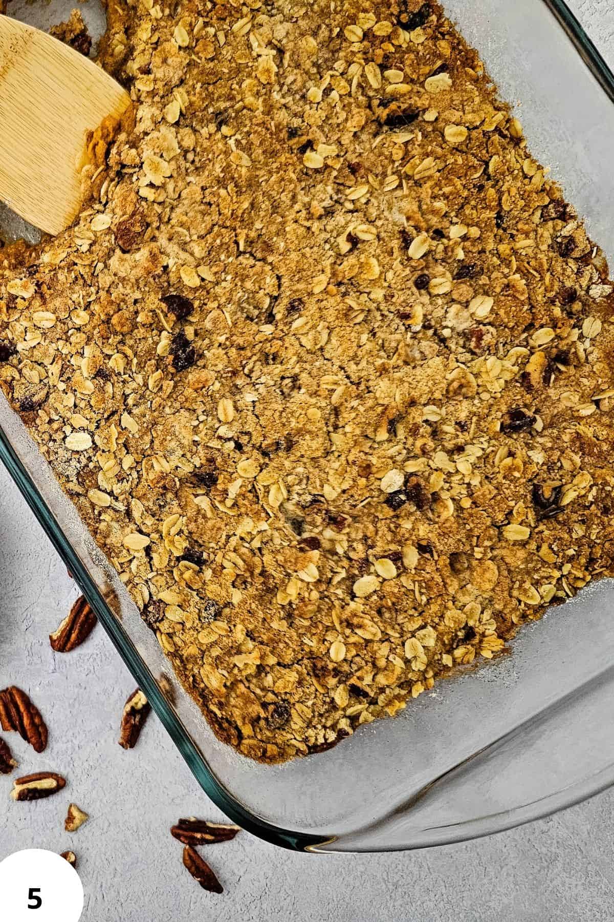 Delicious pumpkin pie crisp topped with buttery pecan oat crumble, perfect for fall desserts.