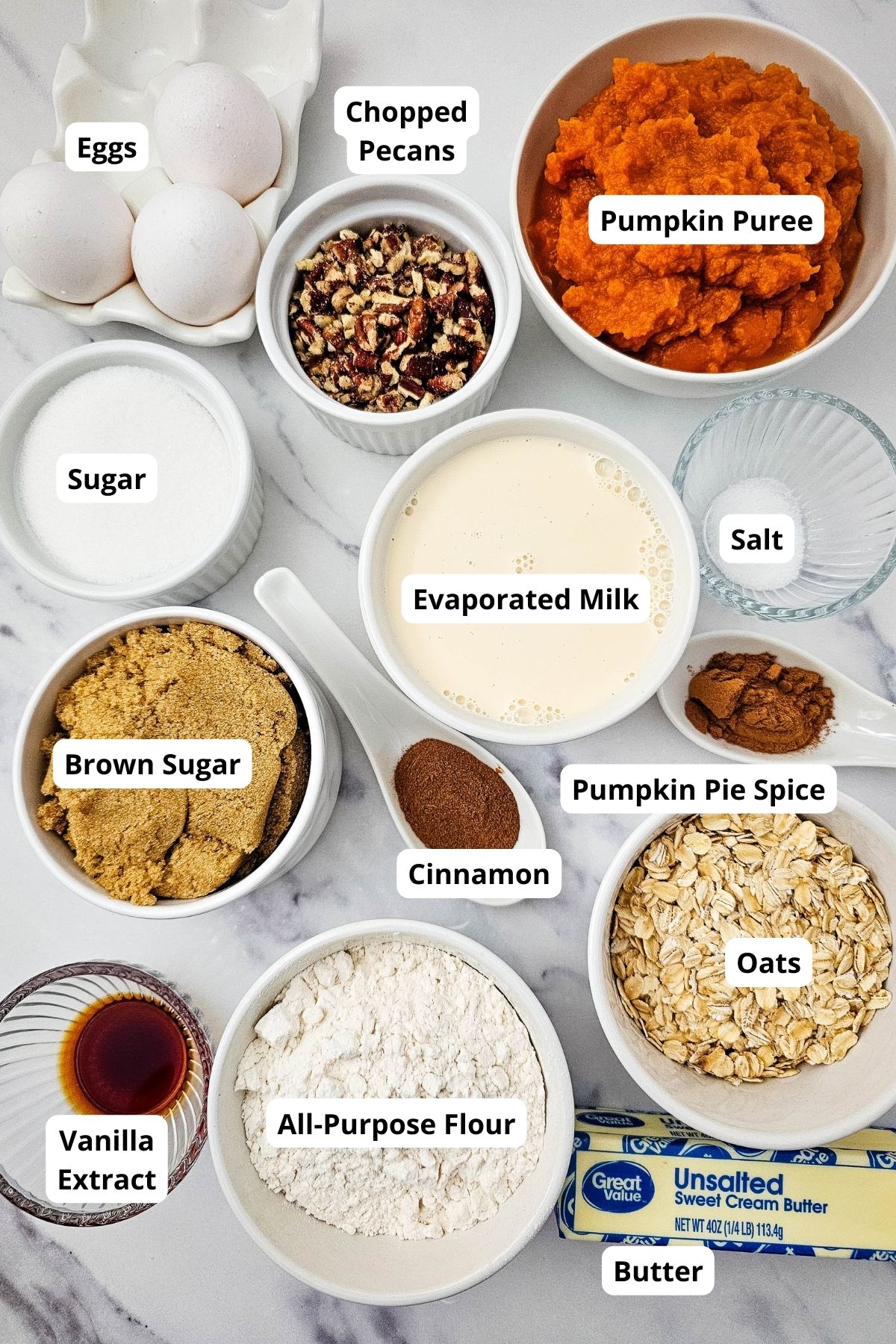 Delicious pumpkin pie crisp ingredients with oats, pecans, and spices for a cozy dessert.