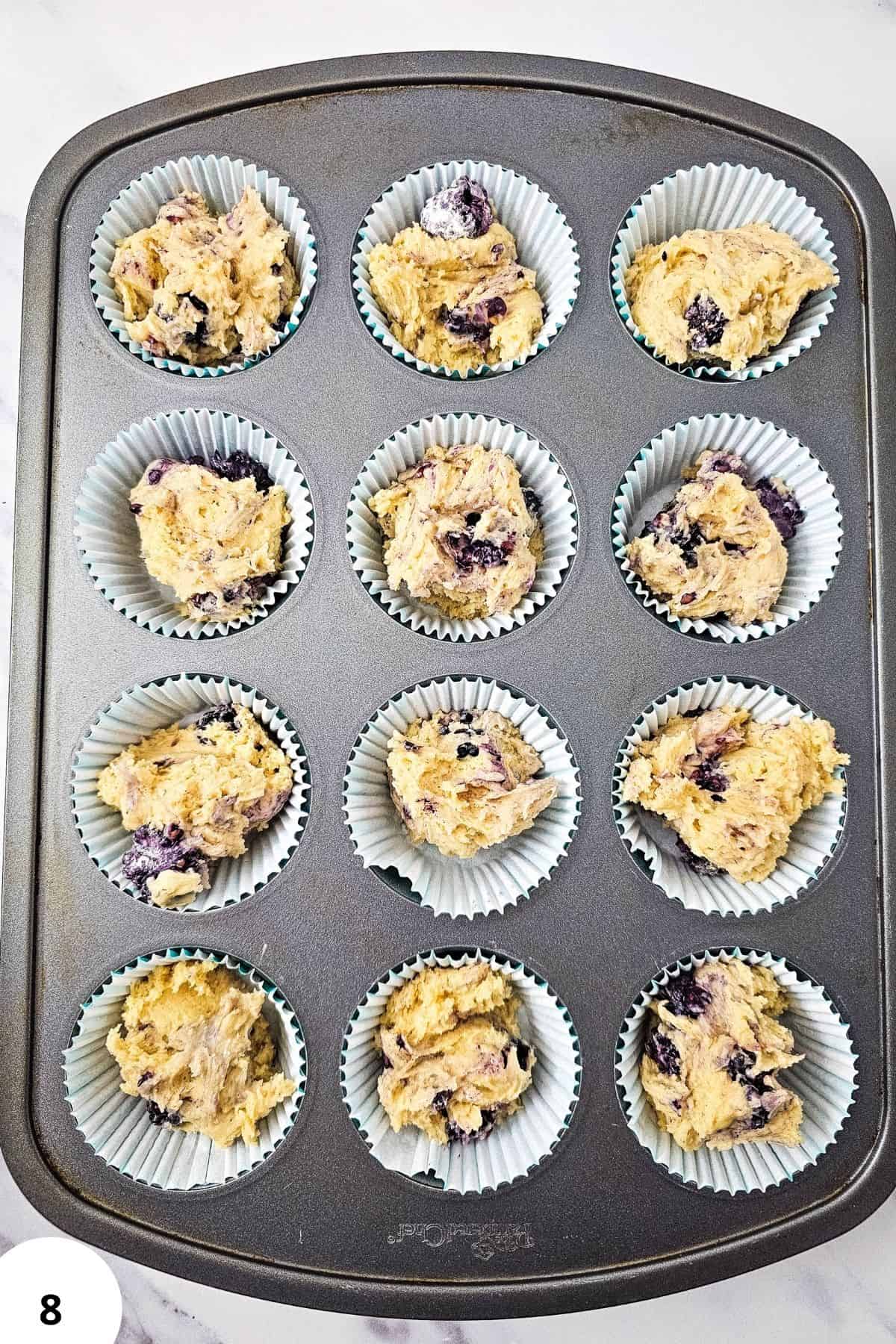 Delicious blackberry muffins with a crunchy streusel topping, perfect for breakfast or snacks. Baked.