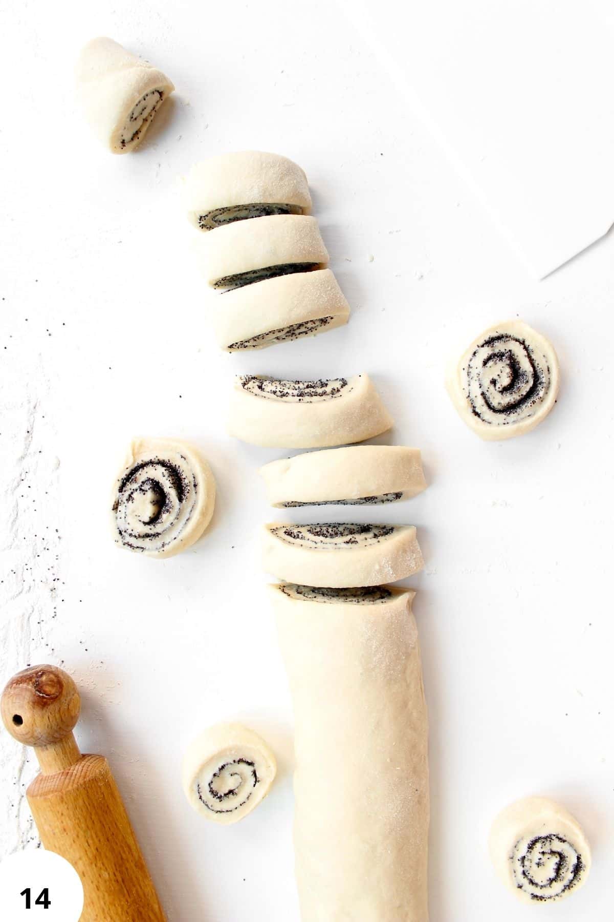 Sourdough rolls with poppy seeds, prepared with stretch and fold technique.