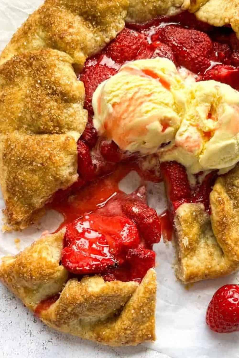 Strawberry galette with ice cream, perfect for summer desserts.