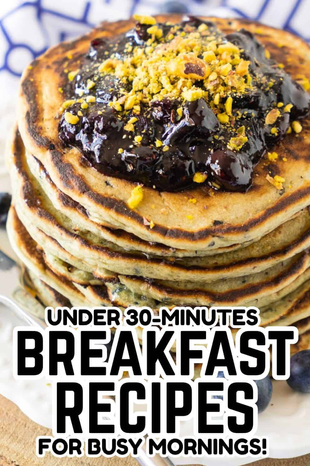 Delicious homemade pancakes topped with blueberry compote and crushed nuts, perfect for a quick brea.