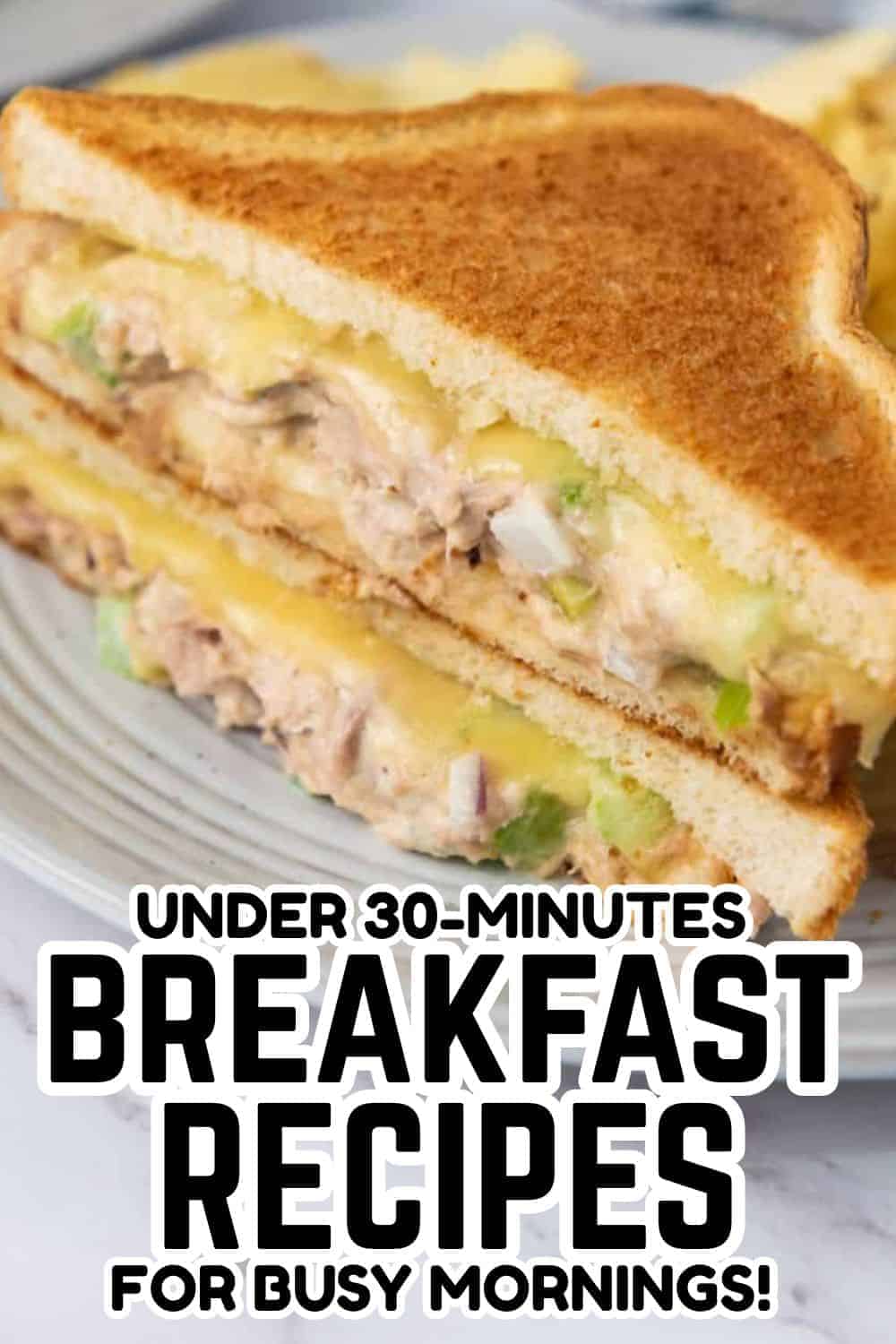 Delicious breakfast sandwich with eggs, cheese, and sausage on toasted bread.