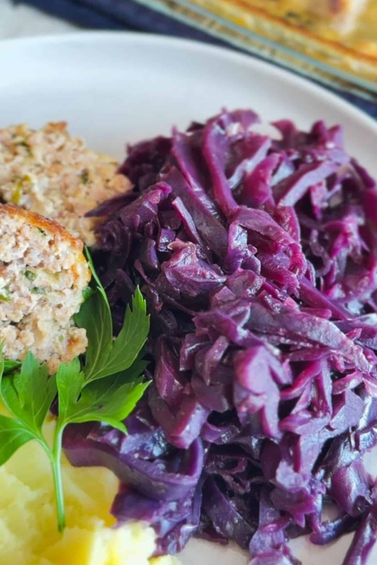 Traditional braised red cabbage with apple, perfect for German cuisine.