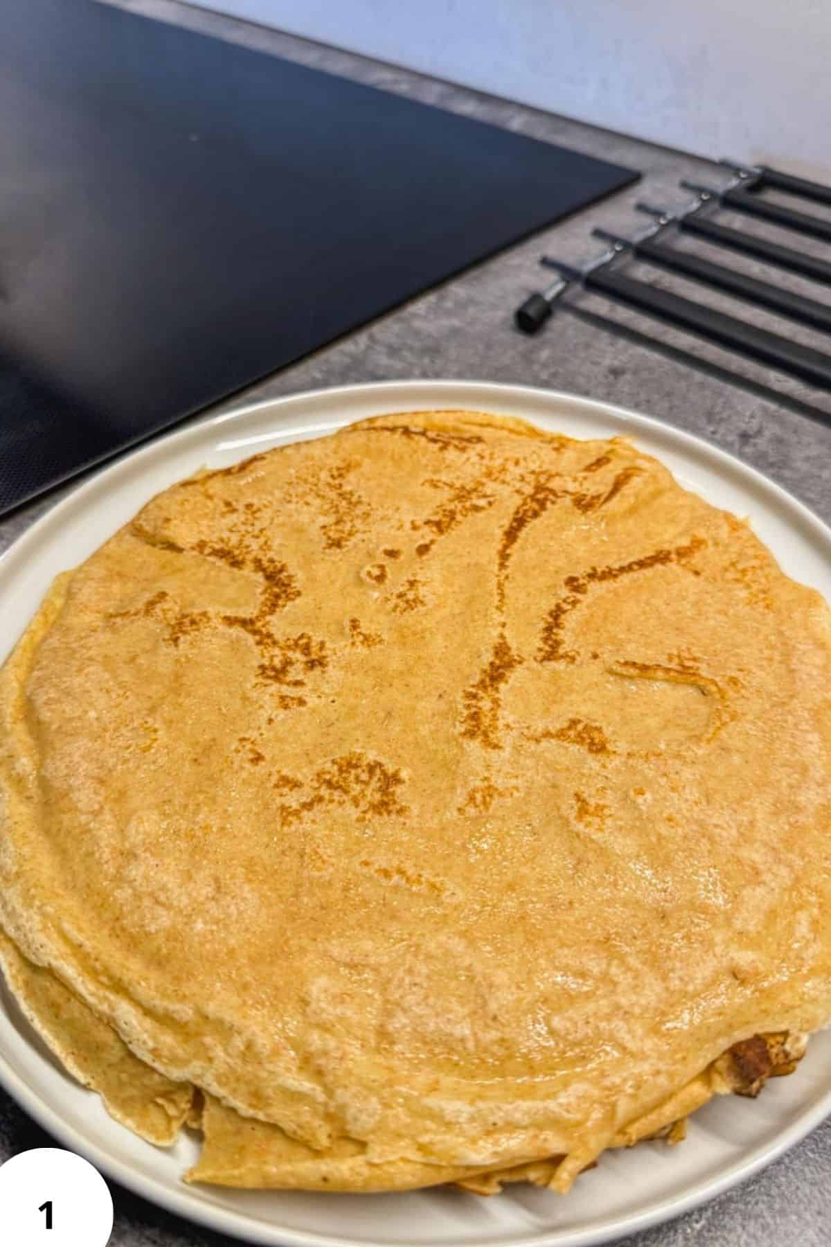 Delicious baked crepe filled with sweet cheese, perfect for breakfast or dessert. Showcasing the art.