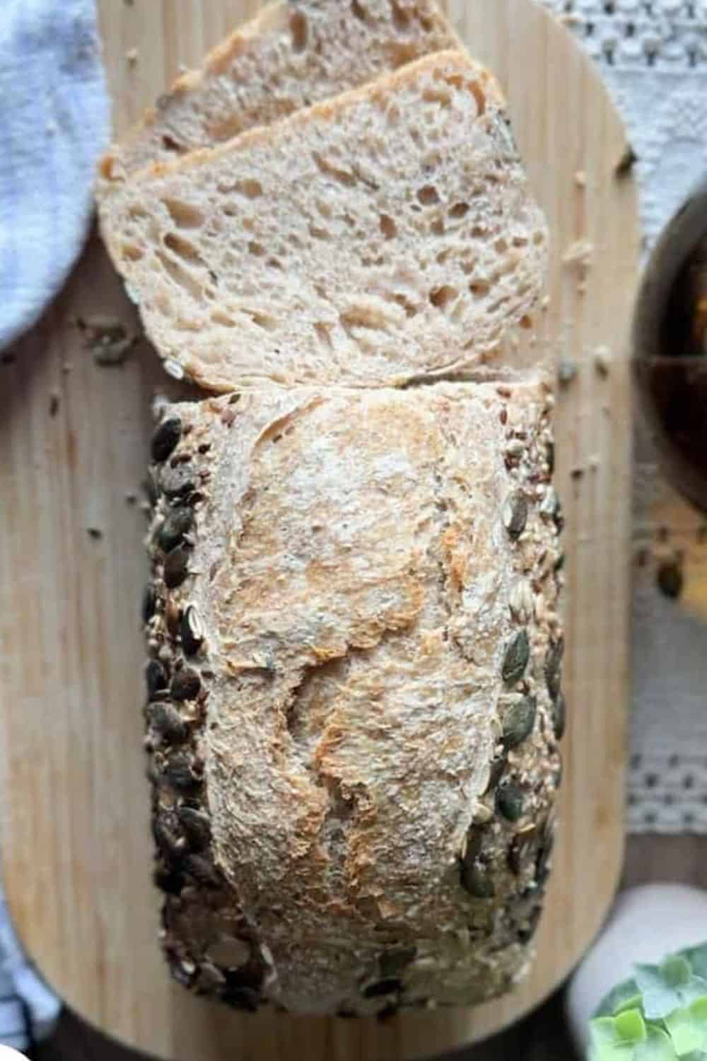 Fresh artisan bread with seeds, perfect for baking enthusiasts and bread lovers.