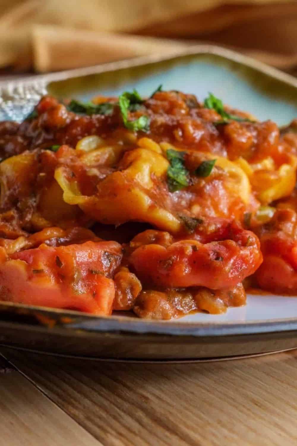 Ground beef pasta with rich tomato sauce and fresh herbs.