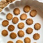 Assorted classic European butter cookies on a white plate.