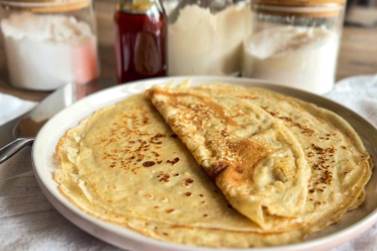 Sourdough Palatschinken folded on a plate, central European style crepes with sourdough discard.