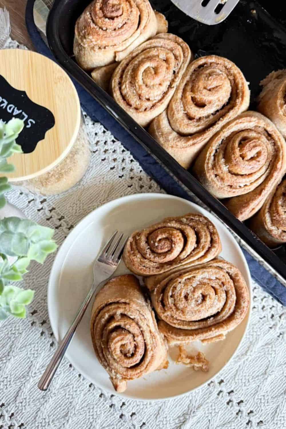 Delicious homemade cinnamon rolls with swirled dough and sweet filling. Perfect for breakfast or a c.