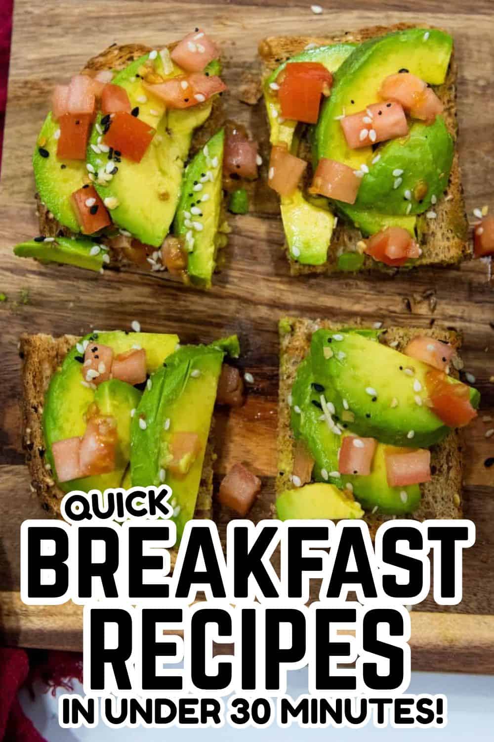 Delicious avocado toast topped with diced ham, tomatoes, and sesame seeds on whole grain bread.