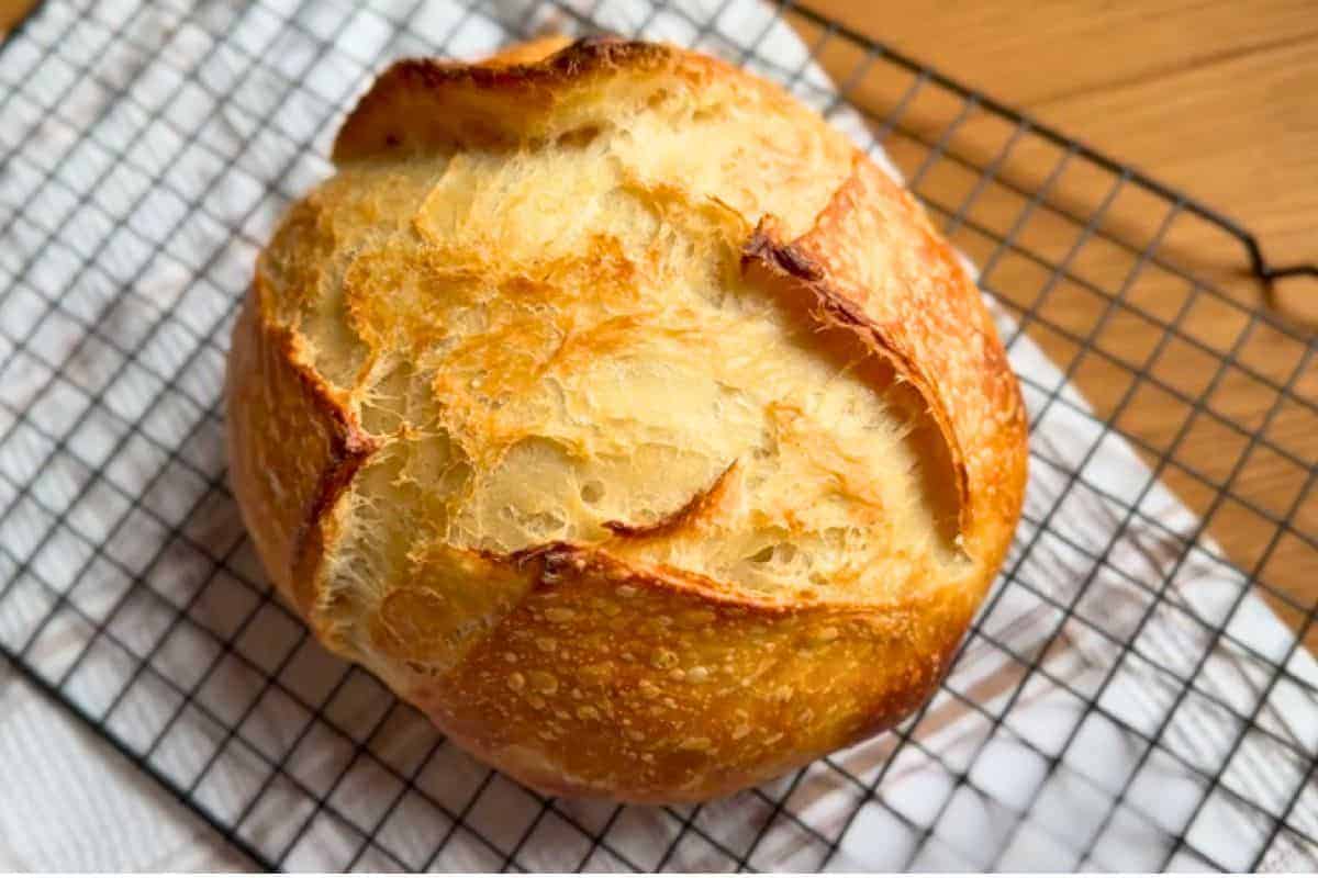 Bread with a golden crust and soft, airy interior, perfect for baking enthusiasts.