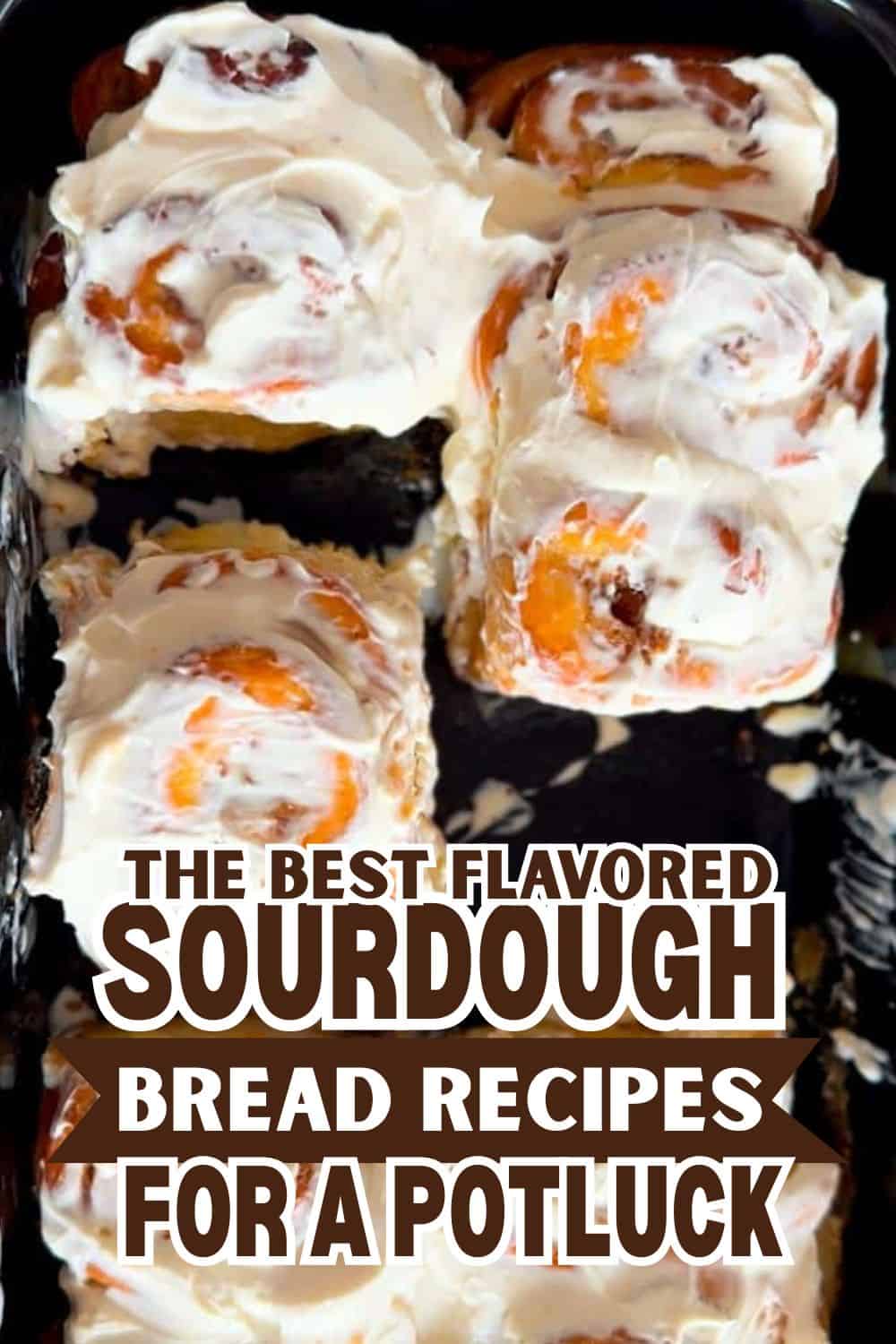 Freshly baked sourdough bread rolls with creamy topping, perfect for potlucks.