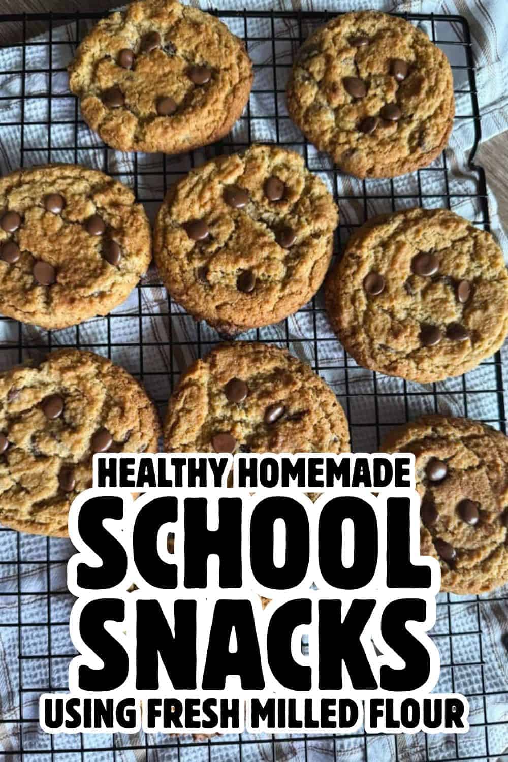 Homemade chocolate chip cookies made with fresh milled flour on a cooling rack.