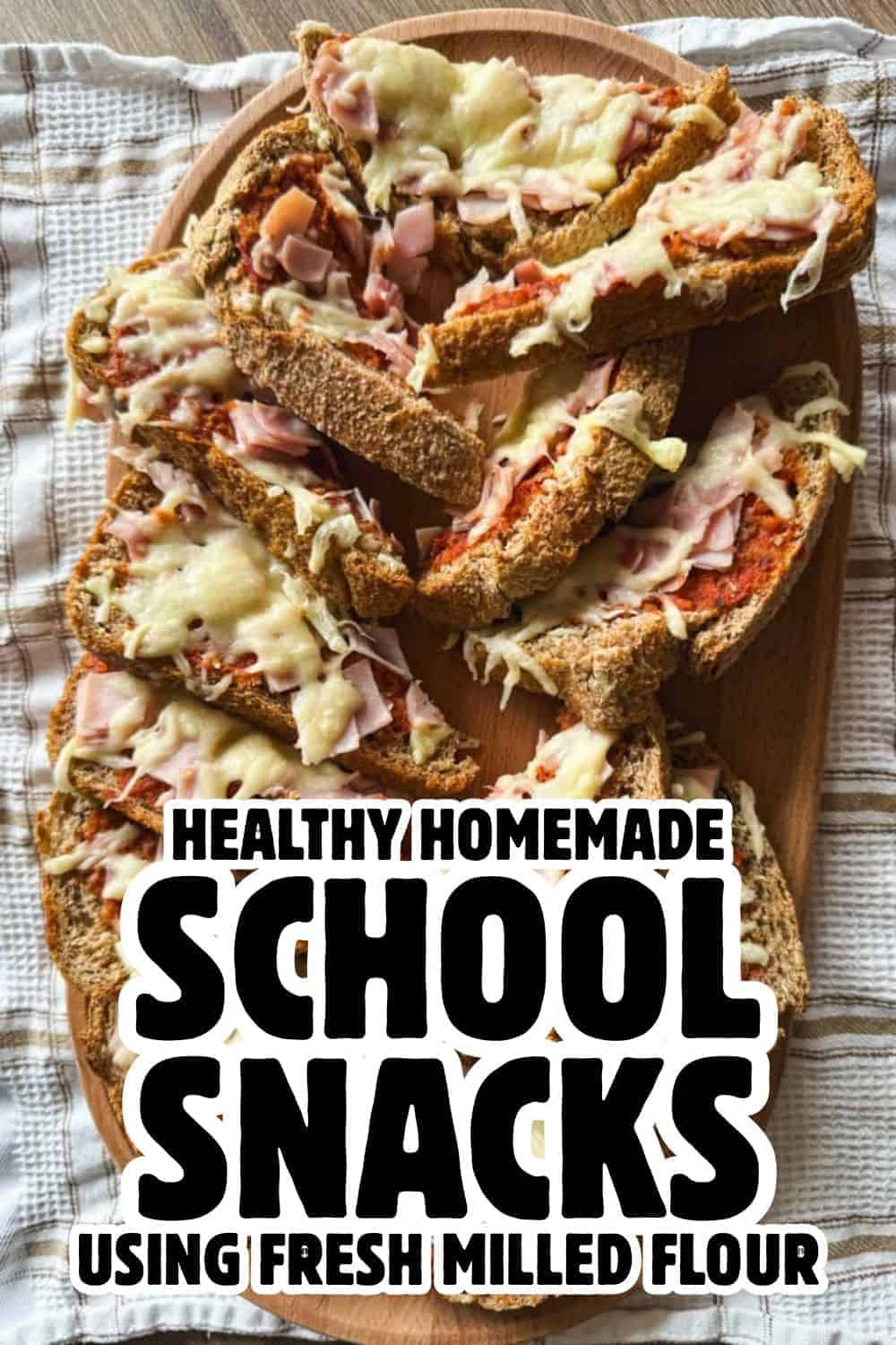 Delicious homemade school snacks with fresh milled flour and cheese on whole grain bread slices.