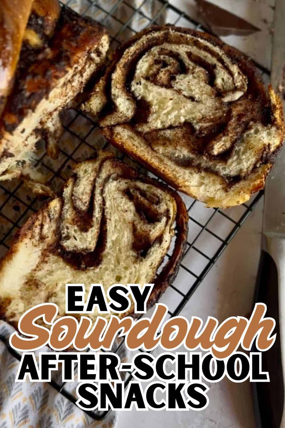 Freshly baked cinnamon swirl bread on cooling rack, perfect for snacks and breakfast.