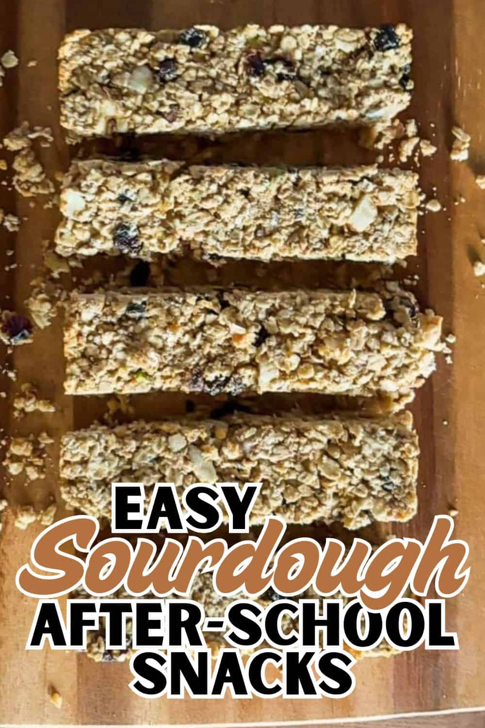 Freshly baked oatmeal berry bars on a wooden surface, perfect for healthy snacks.