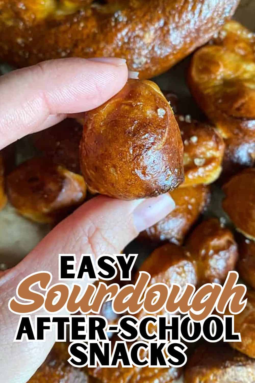 Homemade sourdough bread rolls with a golden crust and soft interior.