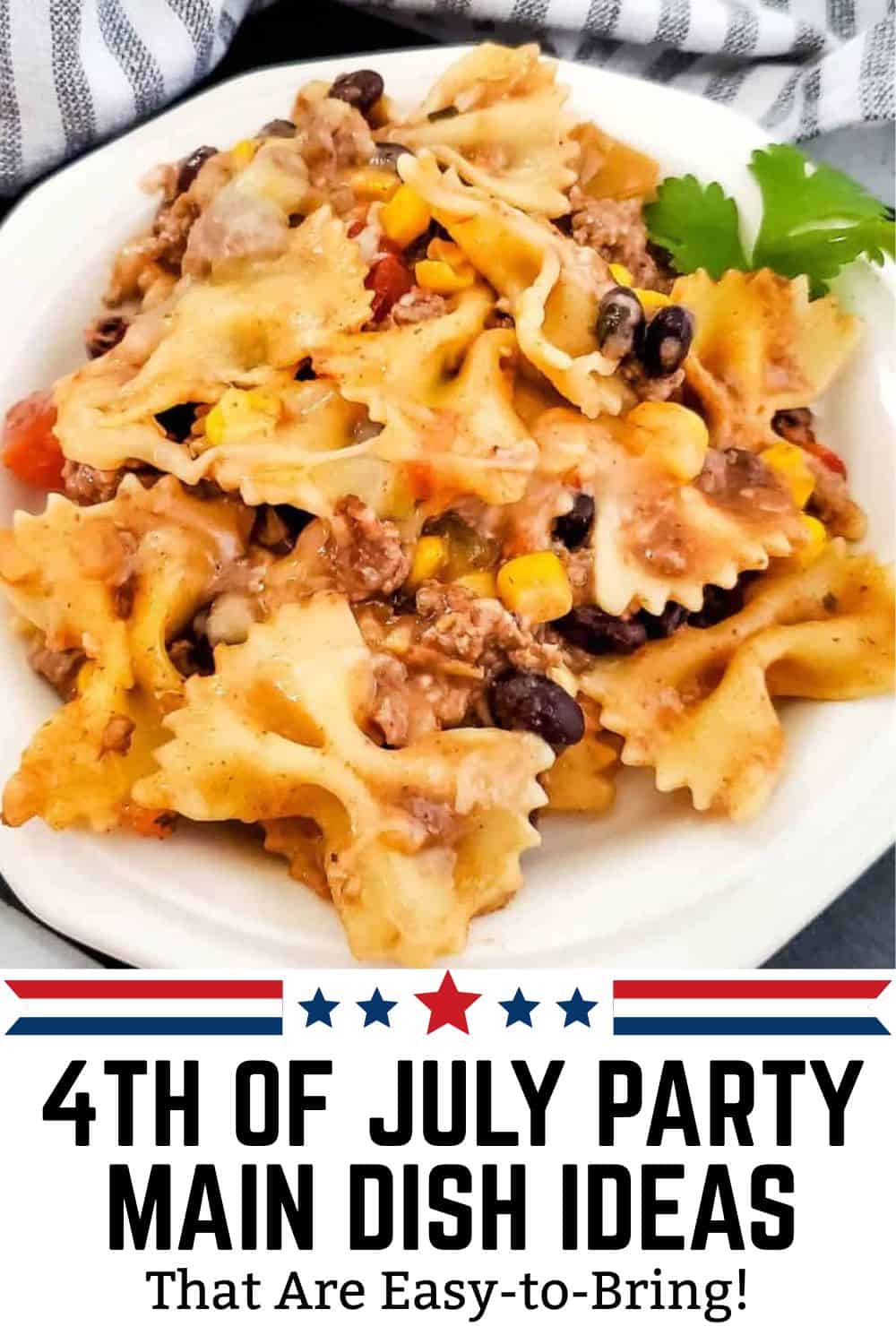 Festive 4th of July pasta salad with colorful ingredients and cheese. Perfect for summer celebration.