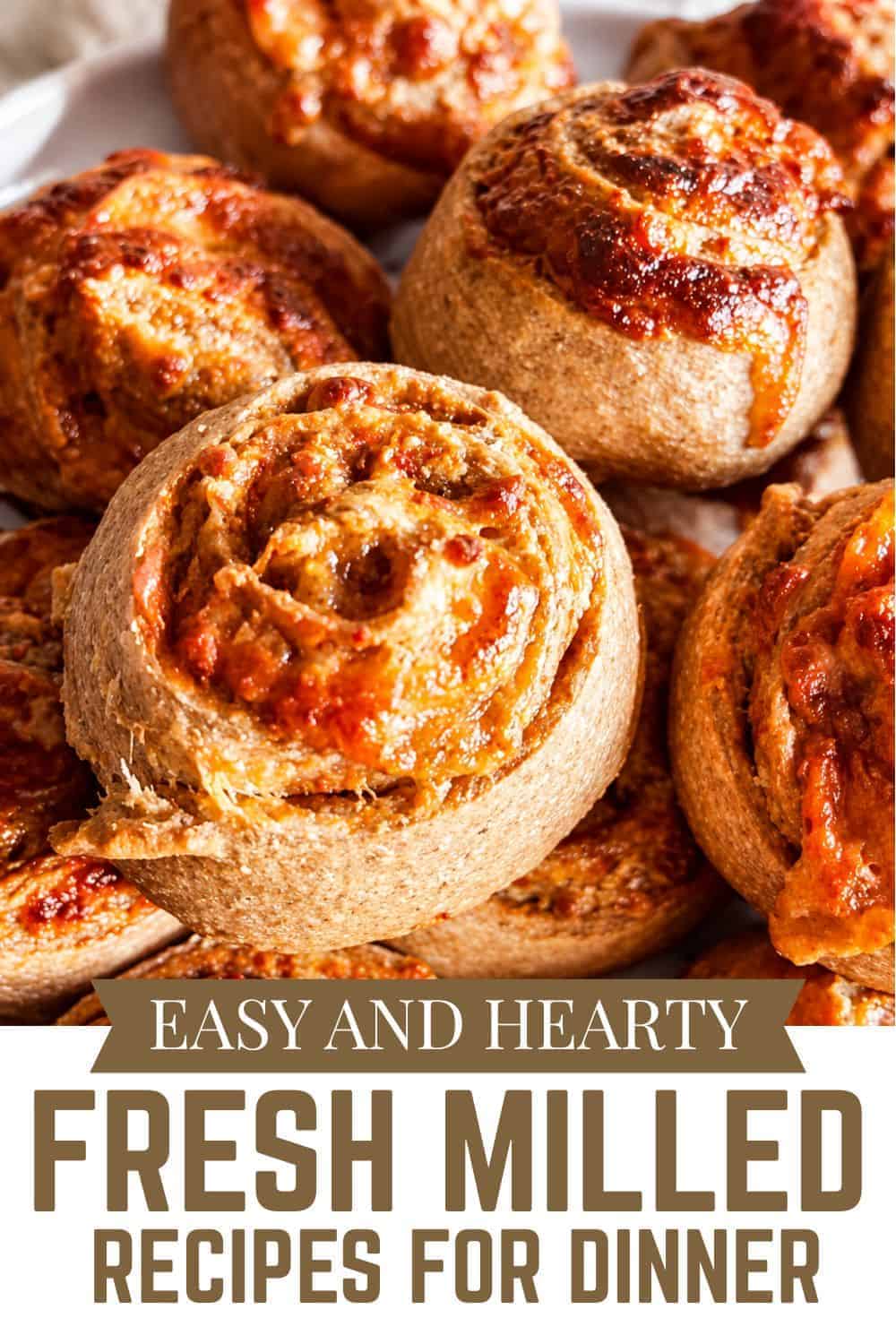 Freshly baked bread rolls with a golden crust, perfect for dinner.