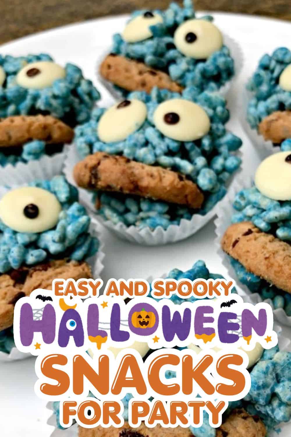 Halloween-themed blue cookies with candy eyes and cookies on top, perfect for spooky parties.