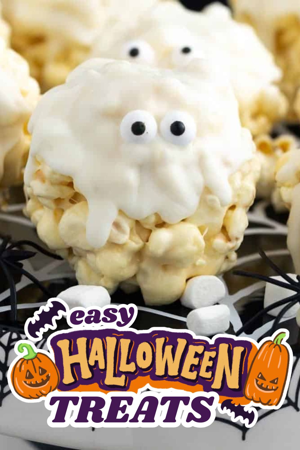 Festive Halloween treat with ghost face made of marshmallow and popcorn.