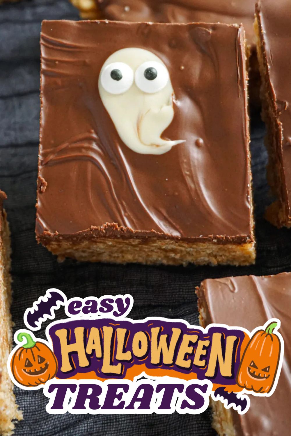 Chocolate Halloween treat with ghost decoration and googly eyes.
