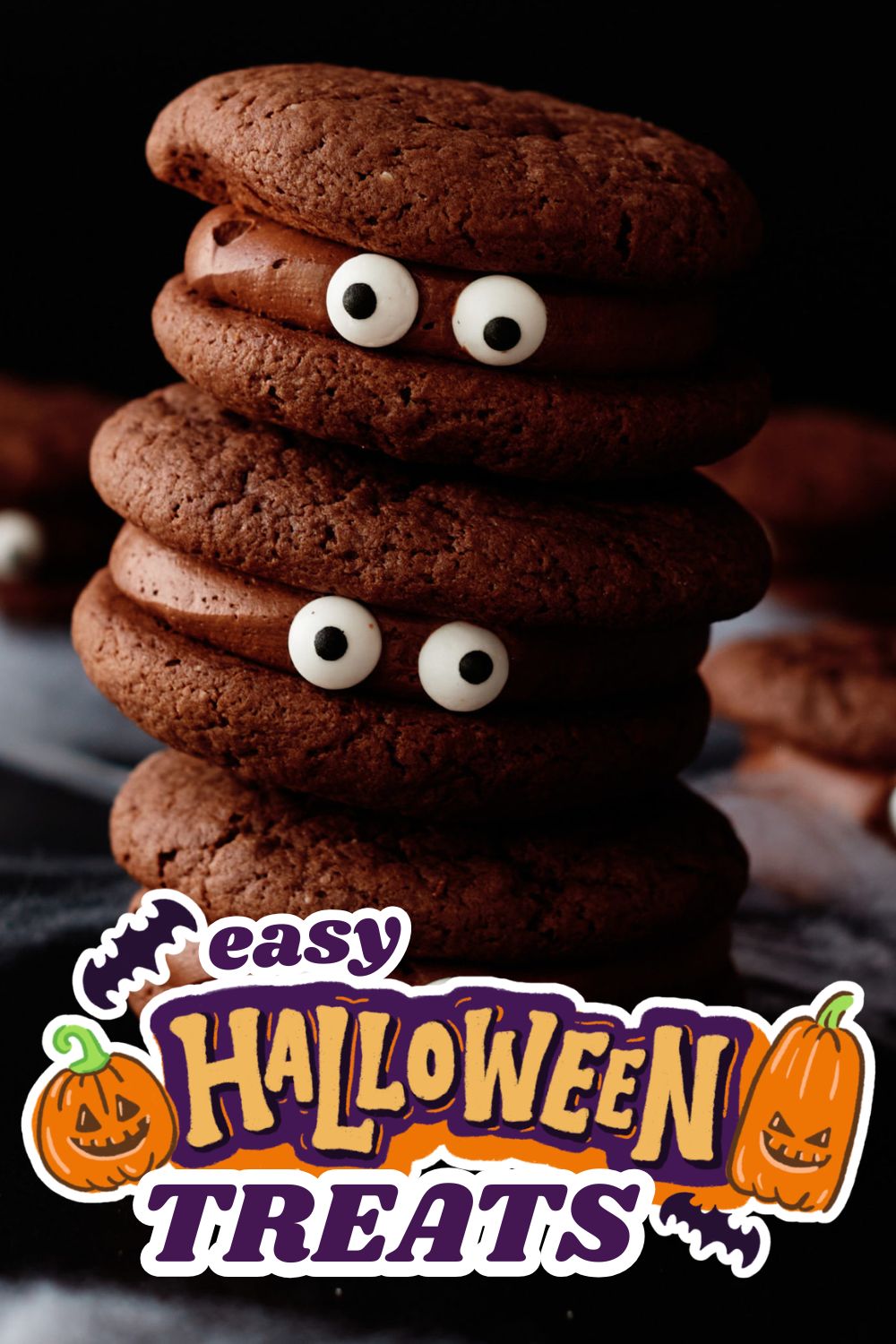 Stack of chocolate cookies with candy eyes for Halloween treats.
