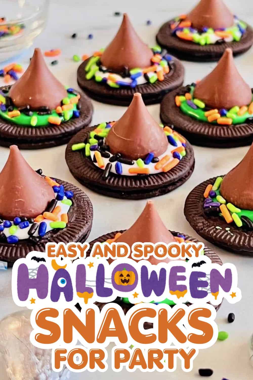 Halloween cookies with chocolate base, sprinkles, and cone-shaped frosting for spooky celebrations.