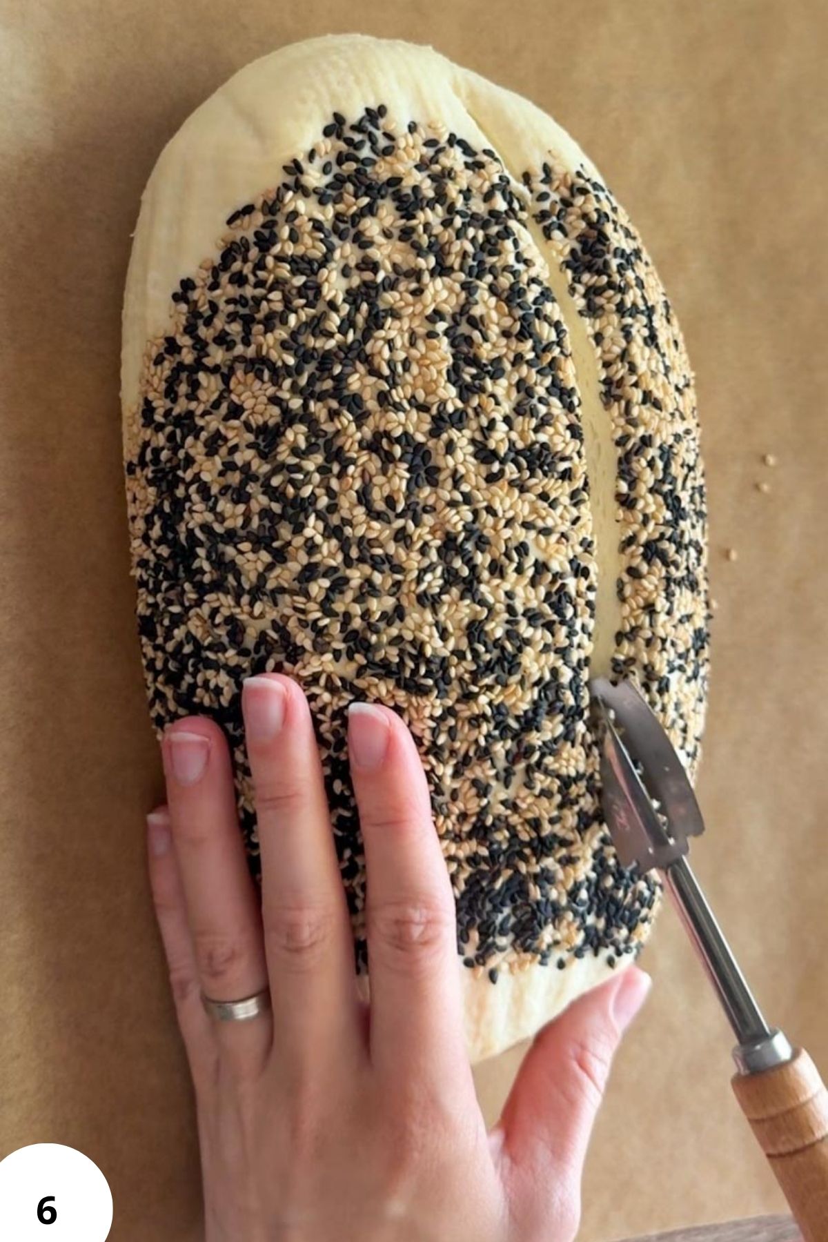 Preparing sourdough bread with stretch and fold technique.