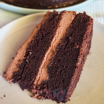 Rich chocolate cake with smooth fudge frosting, perfect for desserts and celebrations.