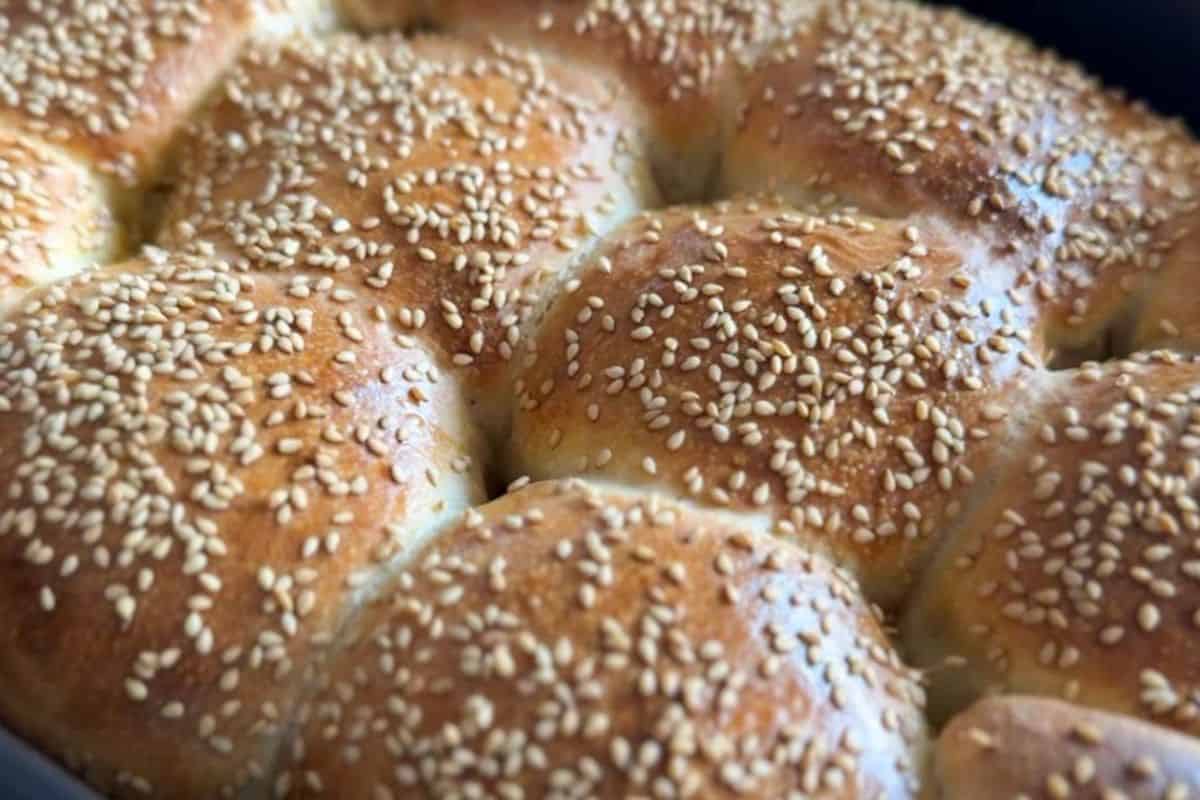 Bread rolls with sesame seeds, perfect for baking and bread making.