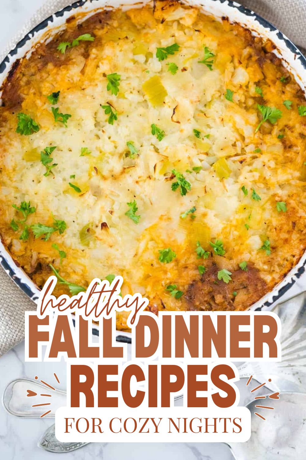 Delicious baked casserole topped with cheese and herbs for fall dinner.