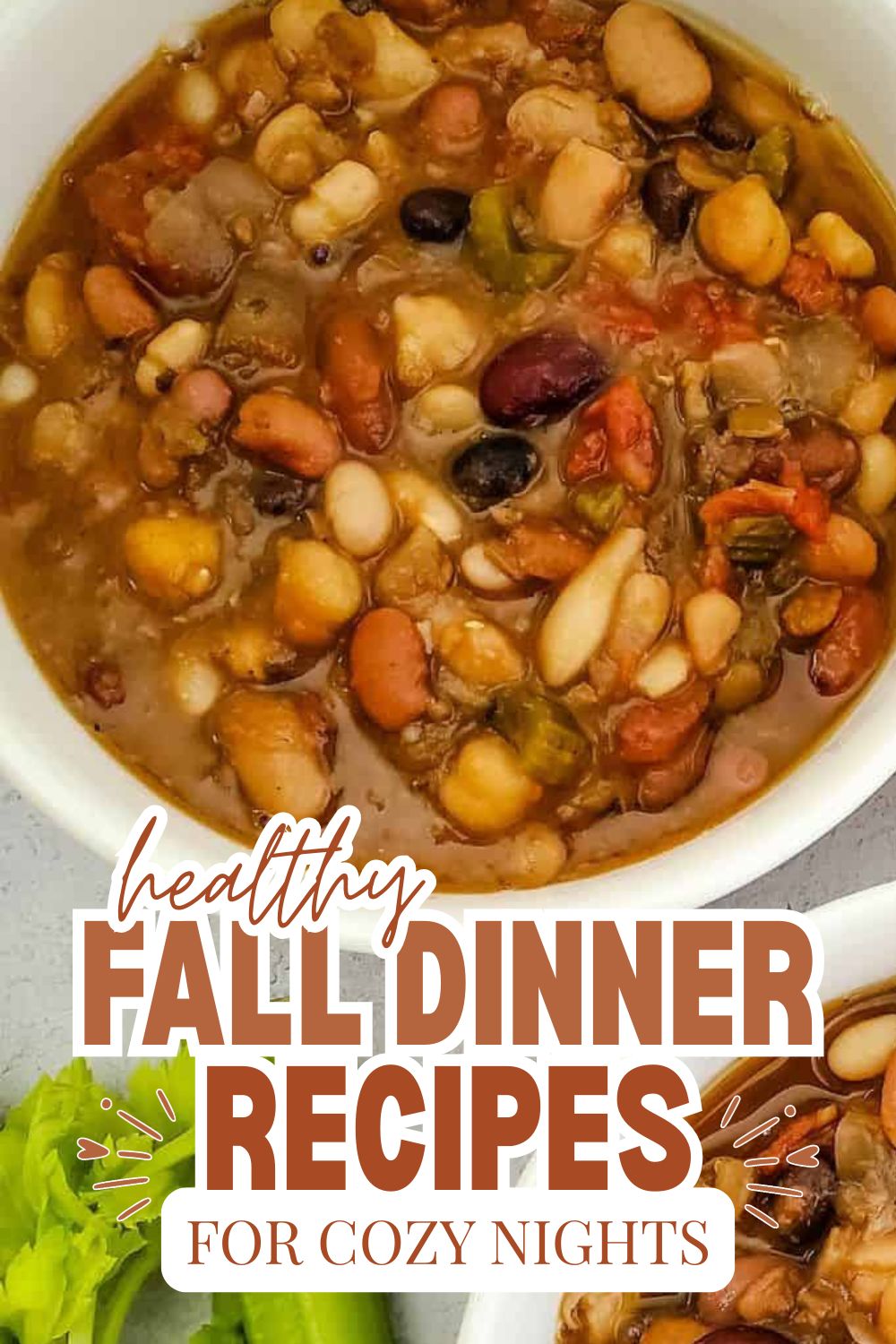 Hearty bean and vegetable stew in a white bowl, perfect for fall dinners.