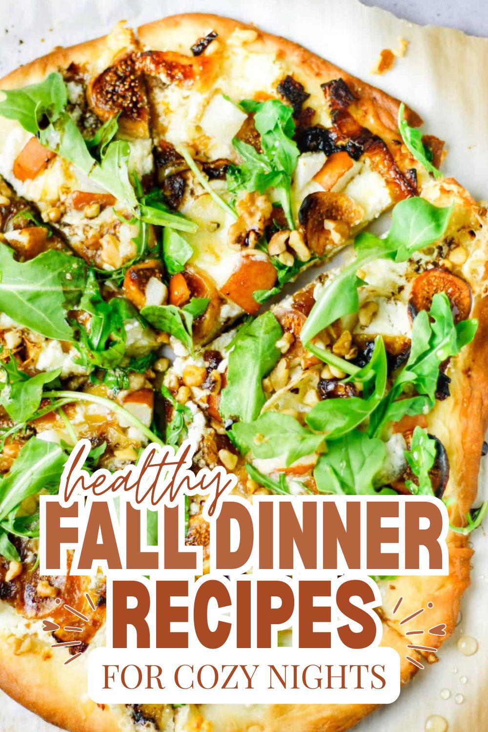 Delicious fall pizza with greens, nuts, and cheese for cozy dinners.