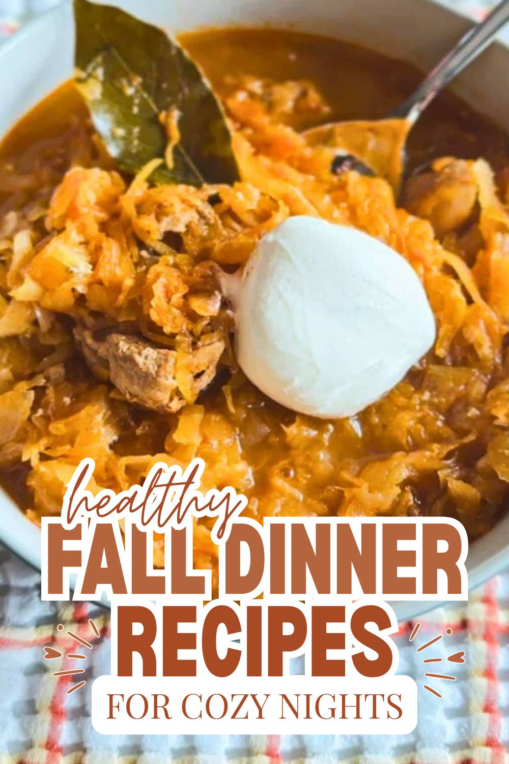 Hearty fall dinner with stew, vegetables, and a dollop of sour cream.