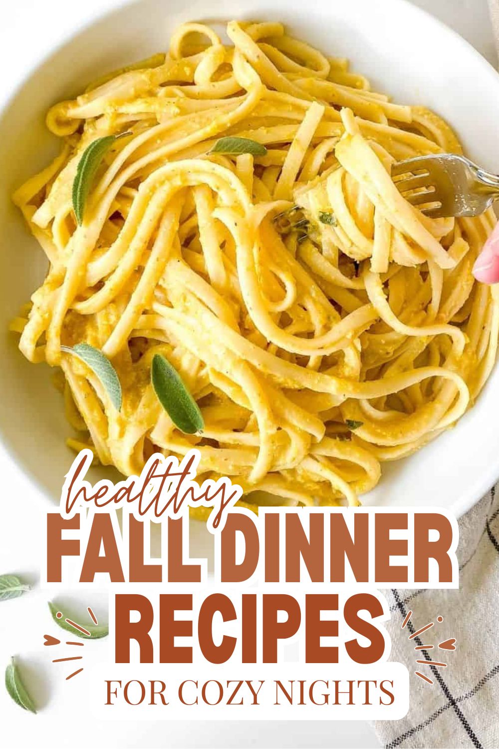 Plate of creamy pasta with herbs, perfect for fall dinners.